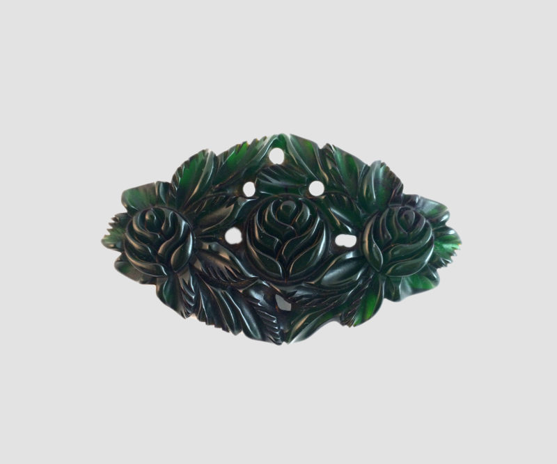semitranslucent-emerald-green-floral-bakelite-pin